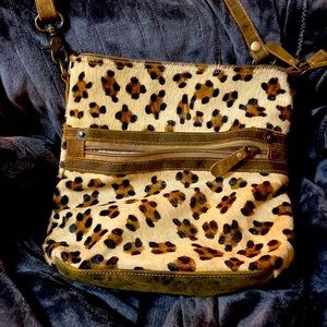 Beautiful animal print Myra bag! Adjustable strap.